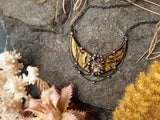 Golden Crescent Moon Pendant with bismuth crystal
