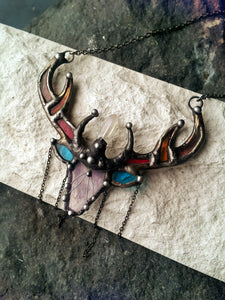 Deer Shaman with bloody horns necklace