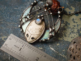 Pendant- Dream reader. Necklace with clay mask, natural moonstone. Shaman ( shamanic ) jewelry, ethno look, ethno style, witchcraft artefact