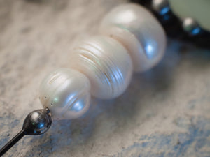 Pendant with 3 pearl, miniature mother of pearl crescent from light green to pink iridescence stain glass.