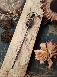 Сhest with an amethyst heart. Chinese metal hair stick.