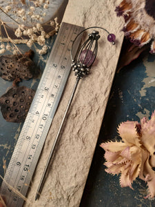 Сhest with an amethyst heart. Chinese metal hair stick.